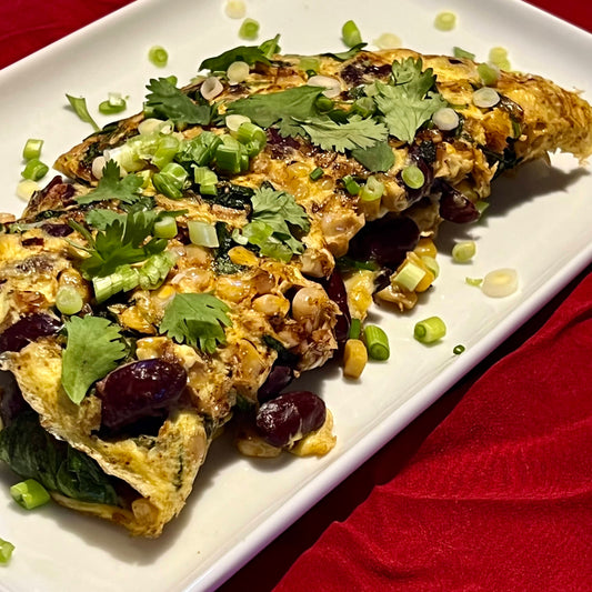 Omelette aux haricots rouges, épinards et maïs